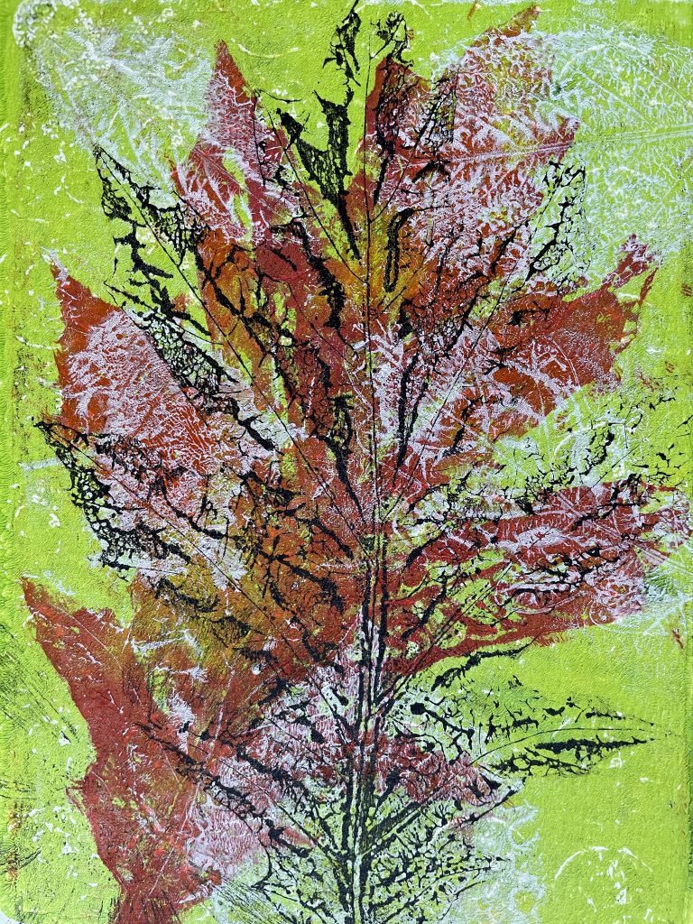 Leaf print on green background